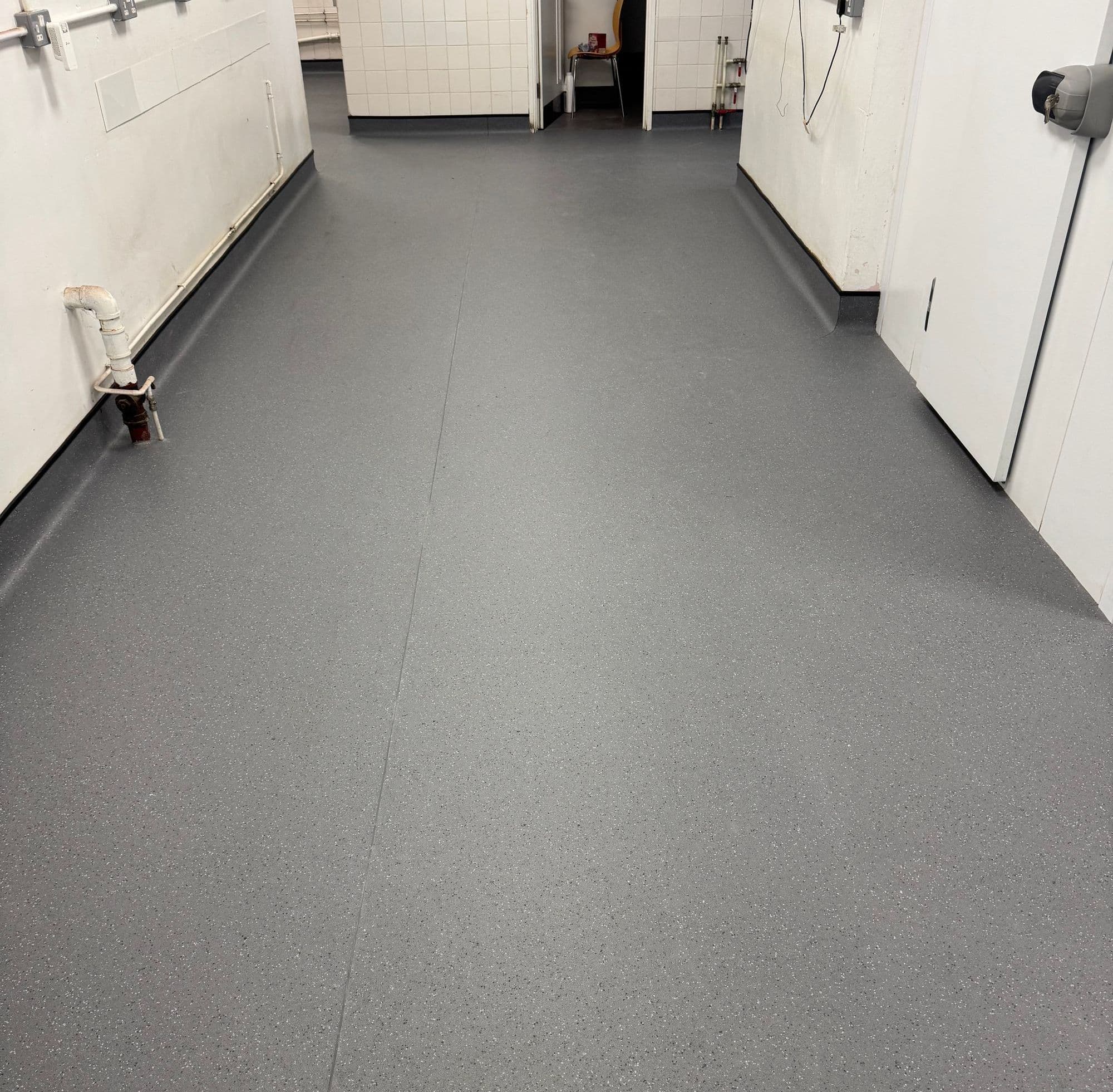 School kitchen fitted with commercial vinyl cap and cove